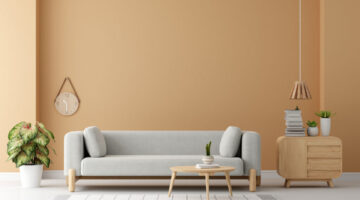 Gray sofa in brown living room with copy space for mock up, 3D r