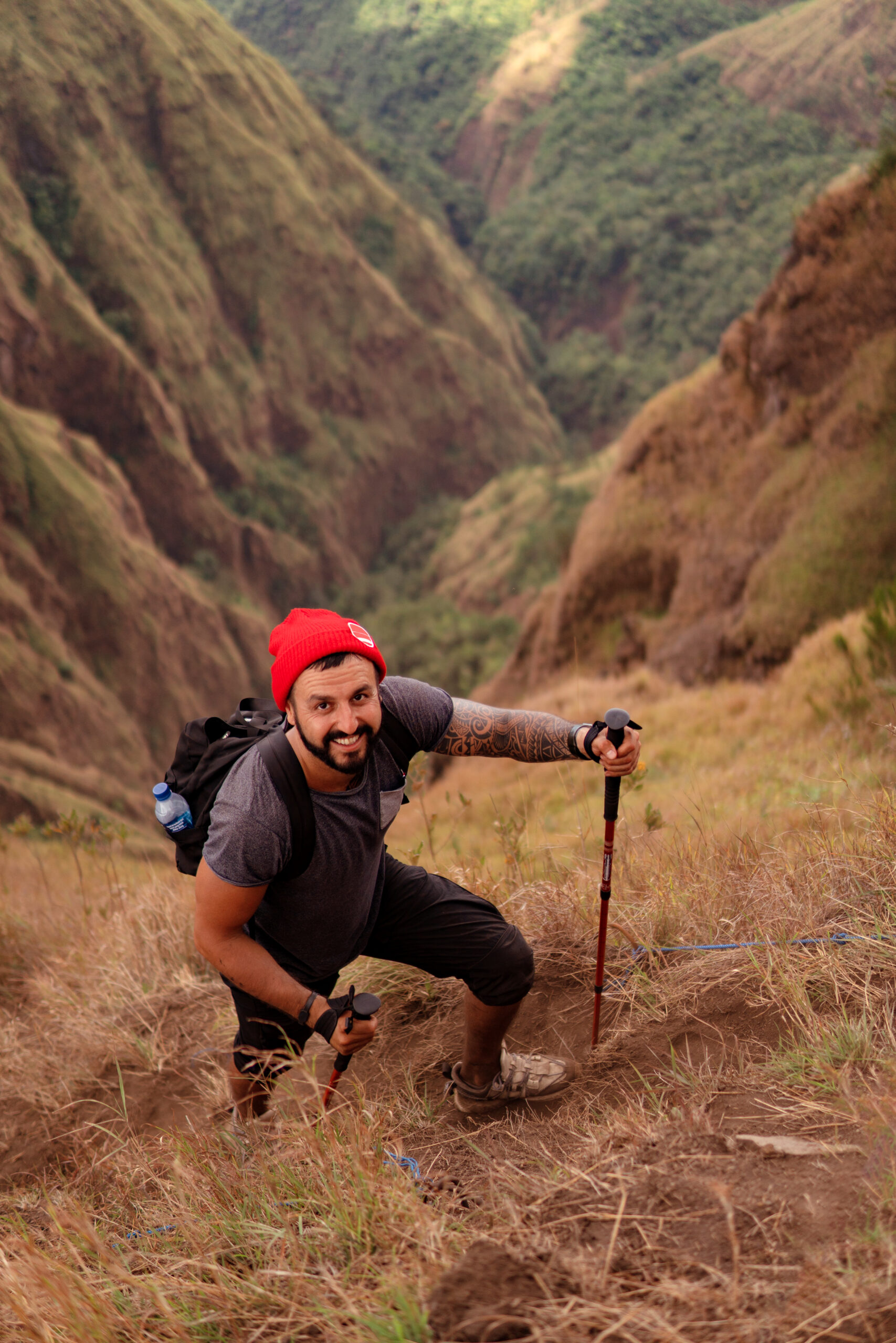 a man walks trekking in the mountains